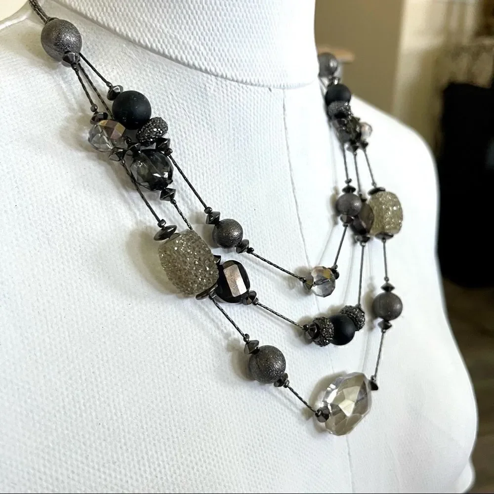 Three strand beaded necklace